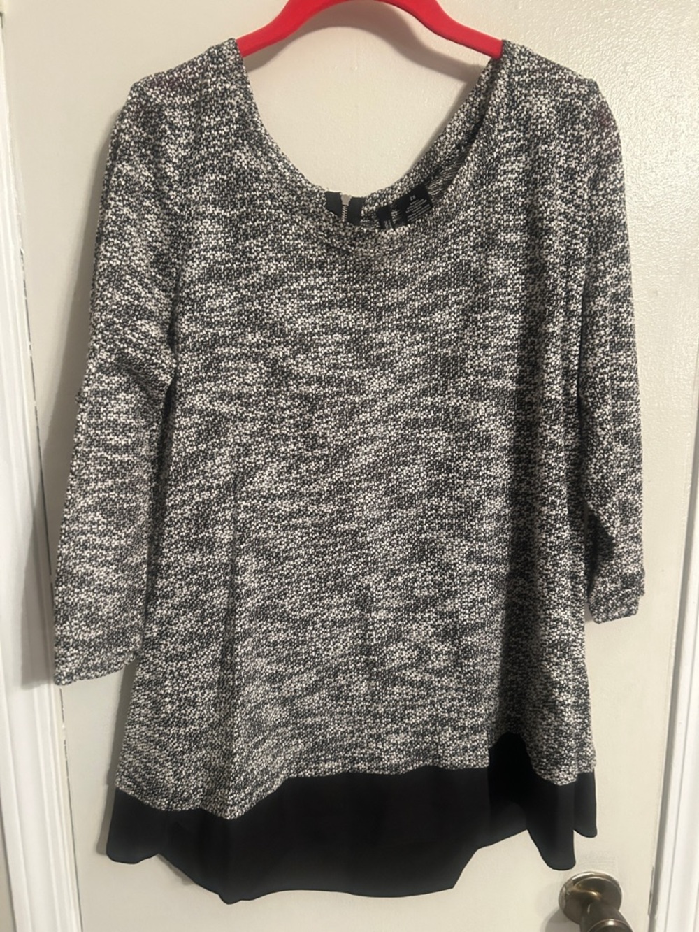 new directions Black and White Knit Blouse with Hem Panel